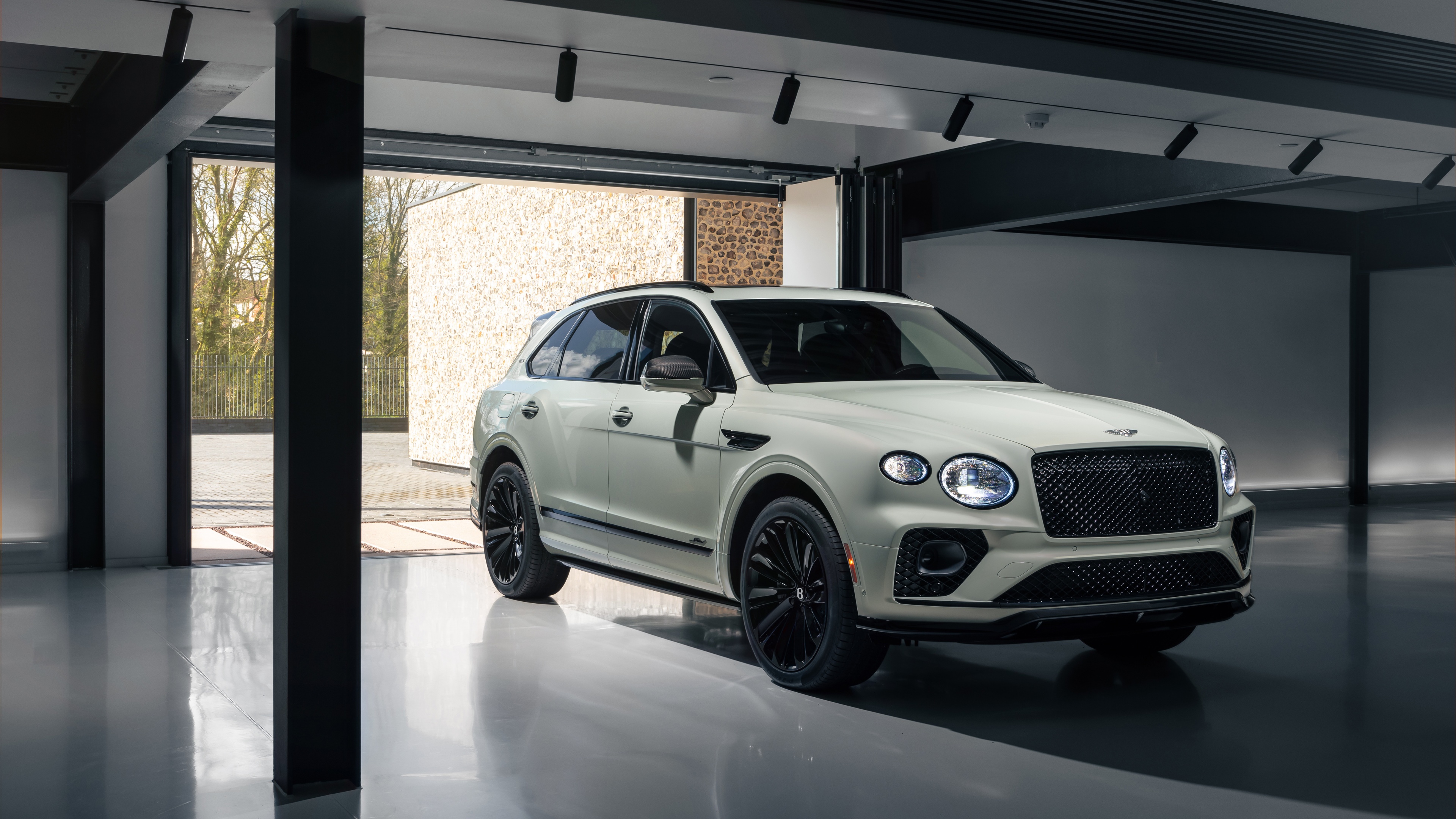 A stylish 4k wallpaper featuring the Bentley Bentayga Speed, a luxurious and high-performance car.