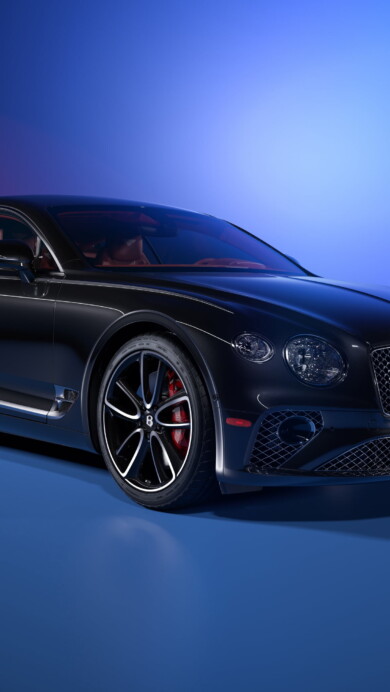 A premium 4K wallpaper featuring the iconic Bentley Continental GT, a masterpiece of elegant design and cutting-edge automotive technology, perfect for car enthusiasts and luxury aficionados.