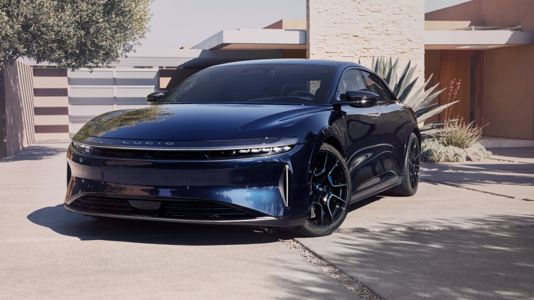 A luxurious 4K wallpaper featuring the Lucid Air in a captivating sapphire hue, highlighting the elegance of this high-end electric car's sleek design, perfect for enthusiasts and admirers of automotive excellence.