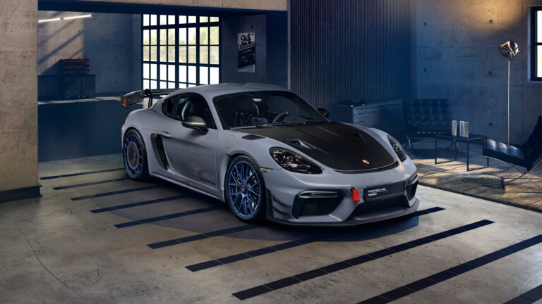 A high-resolution 4K wallpaper featuring the powerful Porsche 718 Cayman GT4 RS, a remarkable sports car known for its speed and elegance, perfect for car enthusiasts and admirers of luxury vehicles.