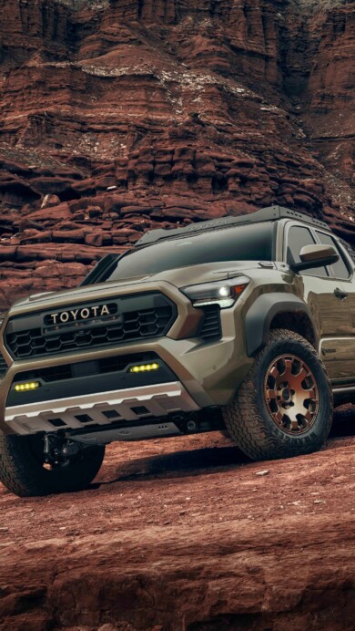 A high-resolution 4K wallpaper featuring the Toyota Tacoma Trailhunter, a capable pickup truck designed for off-road adventures, showcasing its rugged and adventurous spirit.