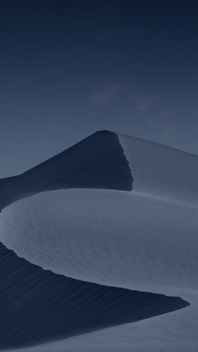 Journey to the heart of the Arabian Desert with this captivating 4K wallpaper capturing the serene beauty of a desert night. Marvel at the majestic sand dunes under a starry sky illuminated by moonlight. Ideal for those who seek the tranquility and mystique of the Arabian Peninsula's desert landscape as a stunning desktop background.