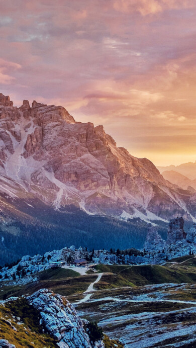 Immerse yourself in the breathtaking beauty of the Cinque Torri Mountains in Italy's Dolomites with this captivating 4K wallpaper. The alpine beauty and rugged landscape create a tranquil and scenic escape. Perfect for travelers and those seeking a desktop background that captures the natural wonder and serenity of this iconic mountain range.