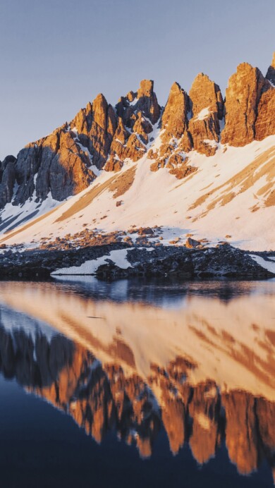 Immerse yourself in the serene beauty of Lago di Piano in Italy with this captivating 4K wallpaper. The alpine lake, surrounded by the stunning landscape of Lombardy, offers a tranquil and scenic escape. Perfect for travelers and those seeking a desktop background that captures the natural tranquility and alpine wonder of this Italian gem.