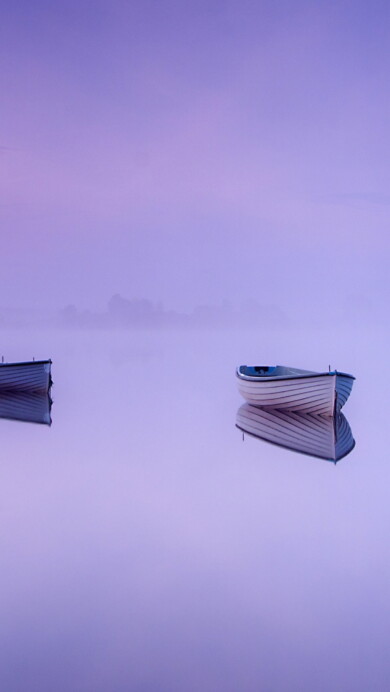 Immerse yourself in the serene beauty of Loch Rusky in the Scottish Highlands with this captivating 4K wallpaper. The tranquil lake, surrounded by the stunning landscape of Scotland, offers a scenic and peaceful escape. Perfect for travelers and those seeking a desktop background that captures the natural tranquility and rugged beauty of this Scottish gem.