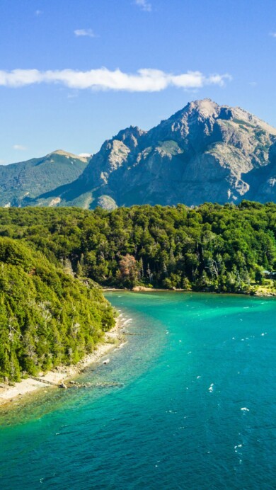 Journey to the pristine beauty of Nahuel Huapi Lake in Argentina's Patagonia region with this mesmerizing 4K wallpaper. Set against the backdrop of the Andes Mountains, the lake offers a serene and scenic escape. Ideal for travelers and those seeking a desktop background that captures the natural tranquility and awe-inspiring landscape of South America.