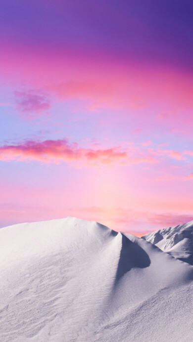 Immerse yourself in the serene beauty of snow-covered mountains with this captivating 4K wallpaper. The tranquil winter landscape, featuring snow-draped peaks and a serene atmosphere, creates a peaceful and scenic escape. Ideal for those who appreciate the beauty of nature in its snowy, tranquil form as a desktop background.