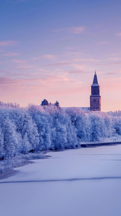 Capture the architectural beauty of Turku Cathedral overlooking the serene Aura River in this exquisite 4K wallpaper. This historical landmark in Finland blends seamlessly with the picturesque riverfront and the European cityscape. Perfect for travelers and those appreciating cultural heritage as an elegant desktop background.