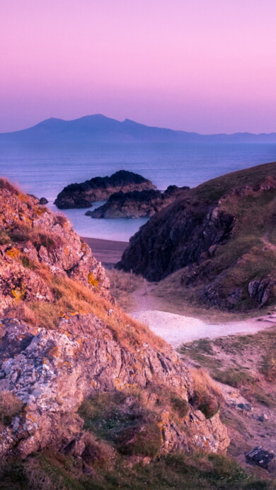 Experience the coastal charm of Twr Mawr Lighthouse in Wales with this exquisite 4K wallpaper. The iconic maritime landmark on Anglesey Island is beautifully captured, offering a tranquil and scenic view that's perfect for travel enthusiasts. Enjoy the architectural beauty against the backdrop of the British Isles as your desktop background.