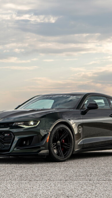 A striking 4K wallpaper showcasing the Hennessey-modified Chevrolet Camaro ZL1 known as The Exorcist. Experience the sheer power and allure of this high-performance muscle car in high resolution. Ideal for car enthusiasts and anyone captivated by speed and automotive excellence for their desktop or device background.