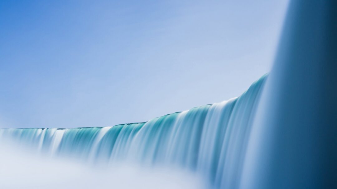 Witness the majestic beauty of Niagara Falls in this stunning 4K wallpaper captured with a long exposure technique. Ideal for your high-resolution desktop background, it portrays the natural wonder of this iconic waterfall.