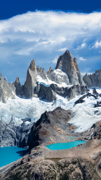 Immerse yourself in the natural beauty of Patagonia with this captivating 4K wallpaper showcasing the iconic Mount Fitz Roy. Located in Argentina's Andes, this image is an ideal choice for your high-resolution desktop background, capturing the breathtaking scenery of the region.