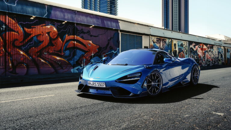 A striking 4K wallpaper featuring the powerful McLaren 765LT 2024. Elevate your screen with the sleek and dynamic design of this high-performance sports car, perfect for enthusiasts seeking a touch of automotive excellence on their desktop or mobile device.