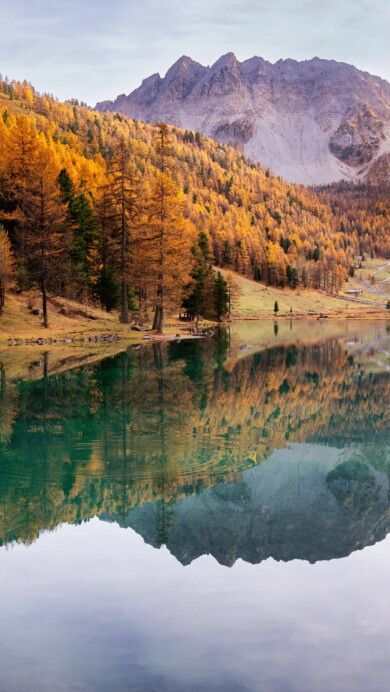 Immerse yourself in the tranquility of Orceyrette Lake in France through this 4K wallpaper. With serene waters and picturesque surroundings, it captures the beauty of this scenic location in high resolution.