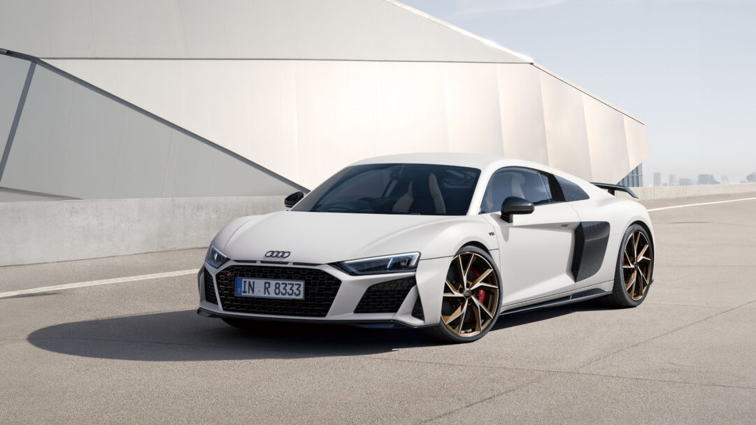 A stunning 4K wallpaper featuring the Audi R8 V10 Coupé Japan Final Edition, showcasing its sleek design and high-performance allure. This luxury sports car, captured in exquisite automotive photography, is perfect for adorning your desktop or mobile background with an infusion of speed, power, and automotive elegance.