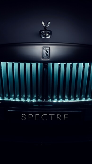 A luxurious 4K wallpaper featuring the Rolls-Royce Spectre, an epitome of automotive elegance. The high-resolution image showcases the sleek design and opulence of this luxury car, making it an ideal choice for your desktop or mobile background.