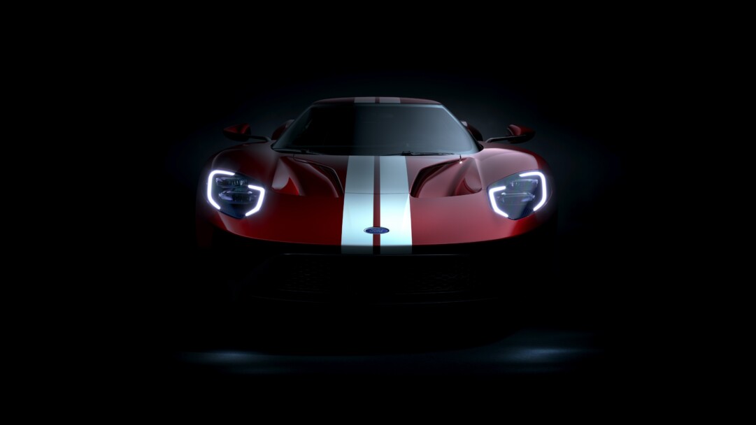 A stunning 4K wallpaper featuring the Ford GT, showcasing its sleek and aerodynamic design. The high-resolution image captures the essence of this high-performance supercar, making it a perfect background for car enthusiasts on both desktop and mobile devices.
