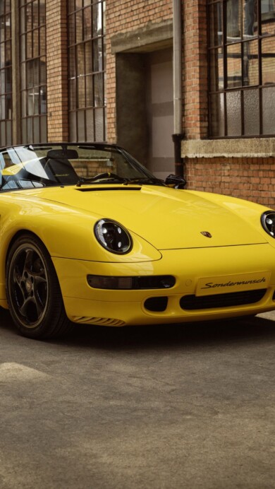 A breathtaking 4K wallpaper showcasing the 2024 Porsche 911 Speedster Sonderwunsch. The image captures the sleek design and iconic curves of this limited-edition sports car, making it a perfect choice for automotive enthusiasts and luxury car aficionados.