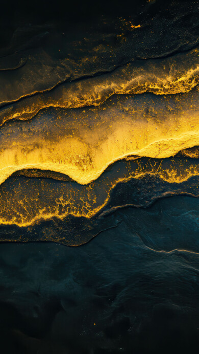 A stunning 4K wallpaper featuring elegant golden waves flowing across a deep, dark background. The contrast between the shimmering gold and the rich darkness creates a luxurious and mesmerizing visual effect, perfect for desktop or mobile screens.