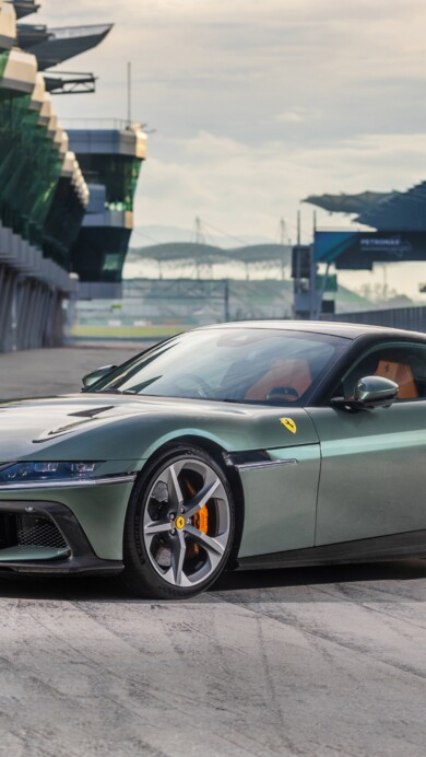 A stunning 4K wallpaper featuring the Ferrari 12Cilindri in Malaysia, showcasing its sleek design and powerful presence. The high-resolution image captures the car against a scenic backdrop, perfect for automotive enthusiasts.